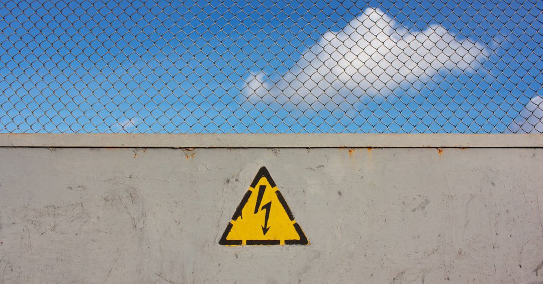 High Voltage Warning on a Fence